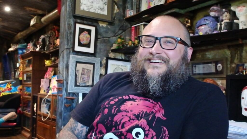 Mewgenics co-creator responds to h3h3 cameo backlash Edmund McMillen in his office in 2025.