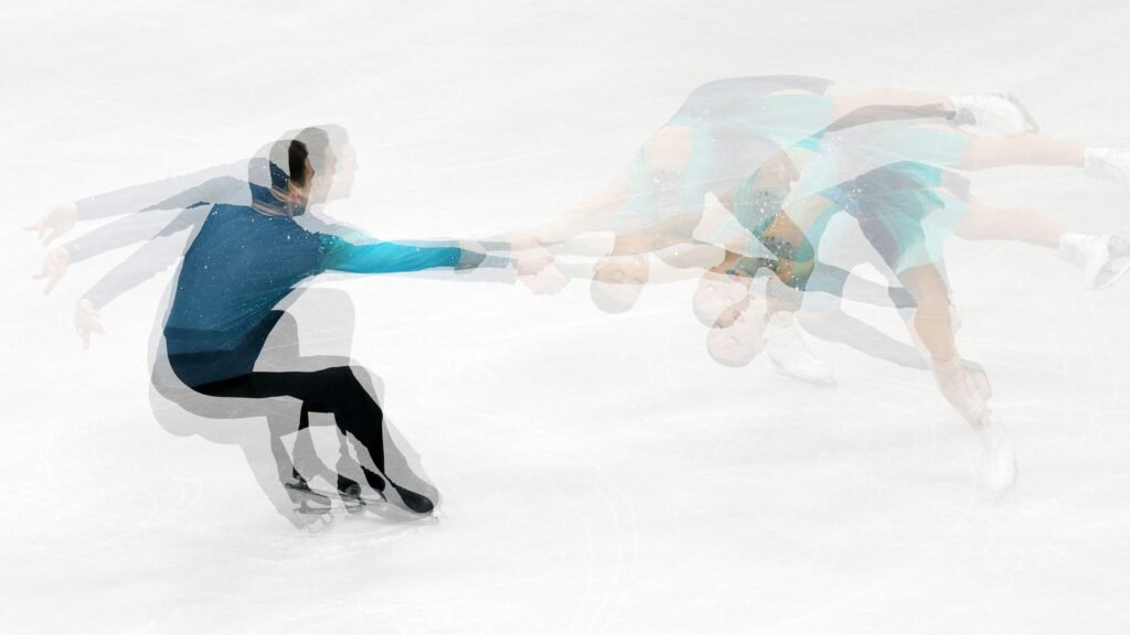Olympic photographers are using a 160-year-old technique to create art on ice, freezing ice skaters in ethereal photographs
