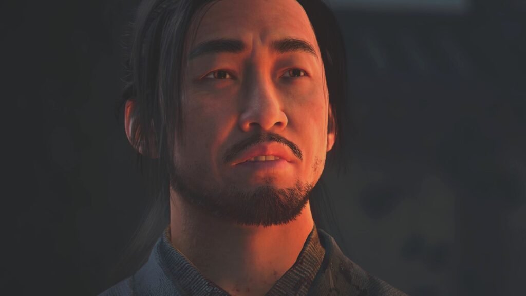 Assassin's Creed Shadows romance options - A dimly-lit close-up of Koshiro talking.