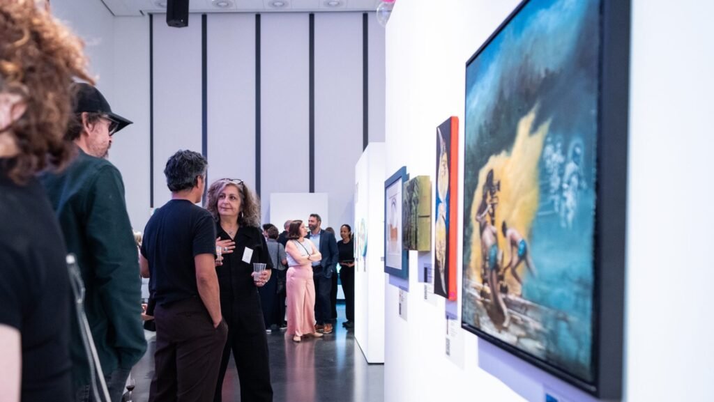 Guests view artwork during the Ottawa Art Gallery&rsquo;s Give to Get Art Auction. Photo by Lindsay Ralph