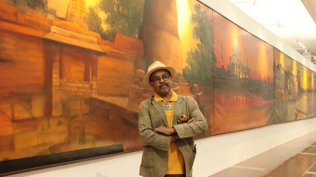 Artist Paresh Maity with his 100 x 8 ft canvas titled Jagriti (Awakening)